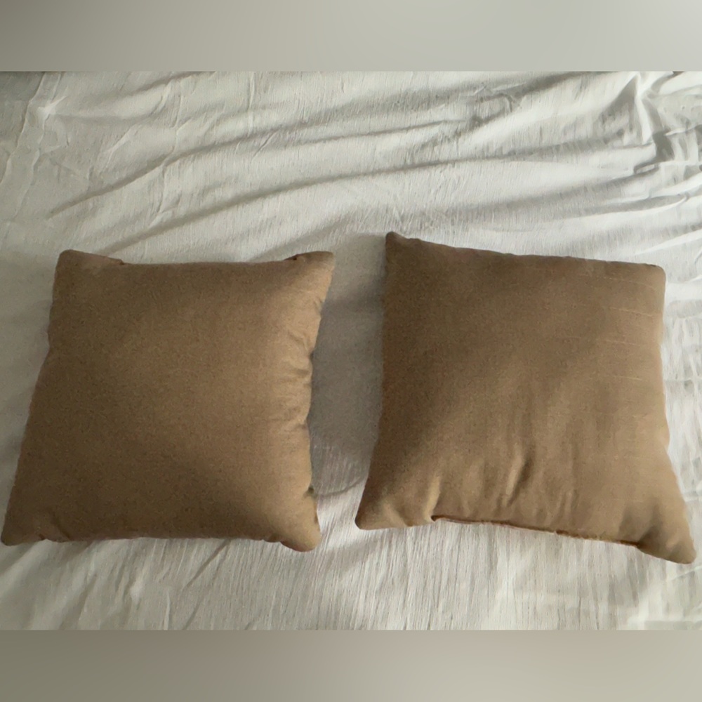 Tan throw pillows